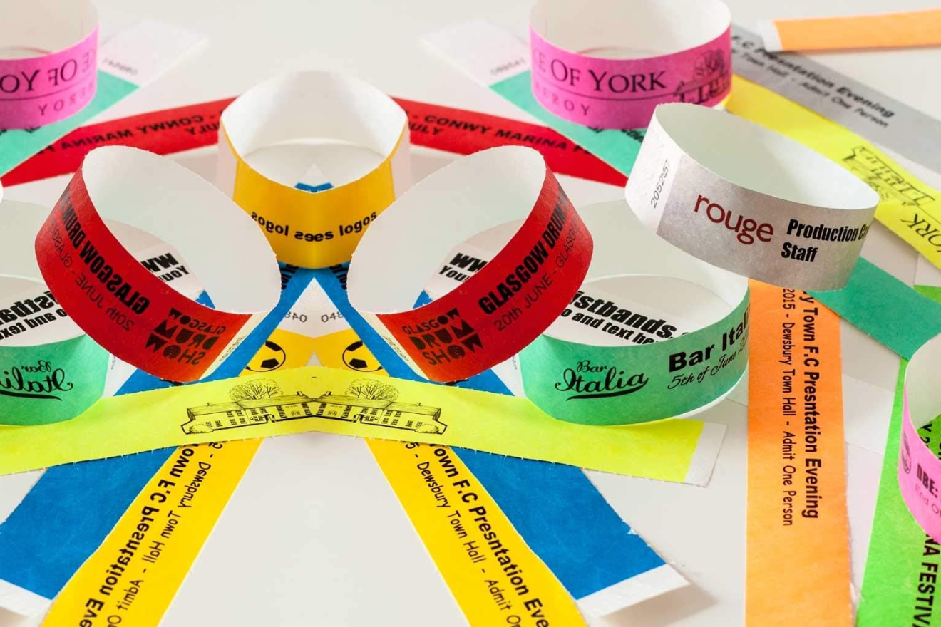 Branded customized wrist bands for events, fundraisers, hospitals, and corporate promotions – available in silicone, Tyvek, fabric, and vinyl