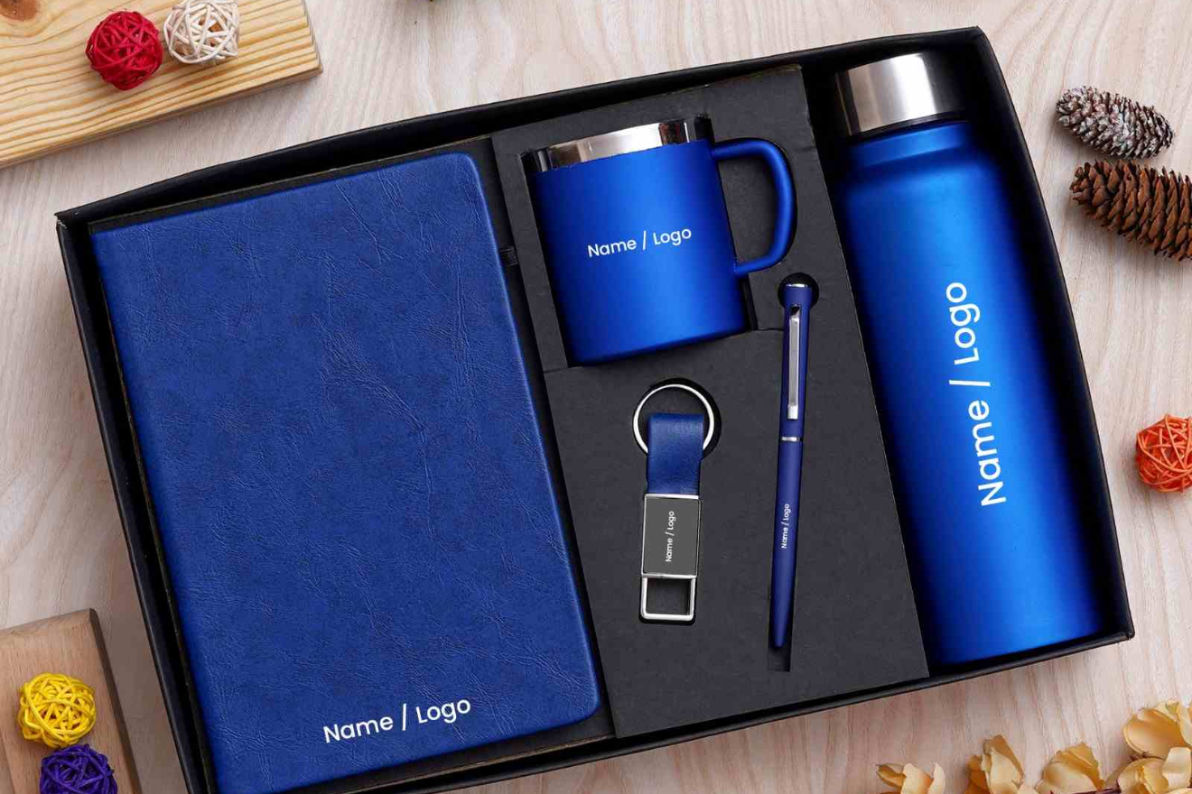 Luxury promotional corporate gift set with custom logo – includes notebook, pen, tumbler, and USB for employee welcome kits, client gifts, and business branding